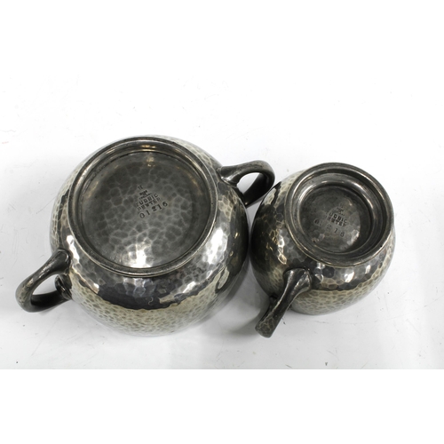 118 - Tudric Pewter cream jug and sugar bowl, pattern 01216 (2) 15 x 7cm.