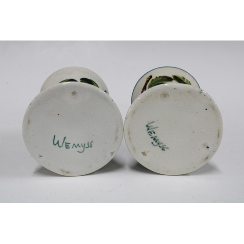 120 - Wemyss ware, a pair of handpainted plums pattern vases of waisted form, painted marks (2) 8 x 11cm.