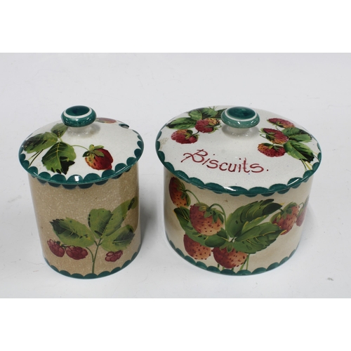 121 - Wemyss Ware handpainted strawberries pattern Biscuits jar and cover together with a matching Wemyss ... 