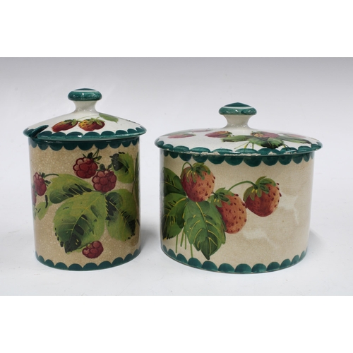 121 - Wemyss Ware handpainted strawberries pattern Biscuits jar and cover together with a matching Wemyss ... 