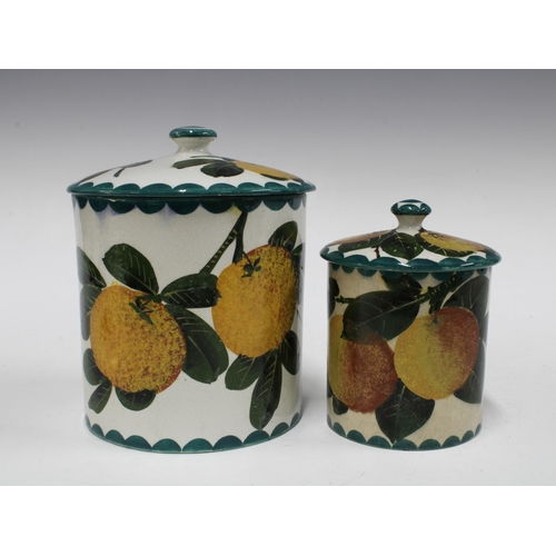 122 - Two Wemyss Ware preserve jars with covers, handpainted oranges pattern, impressed and painted marks ... 