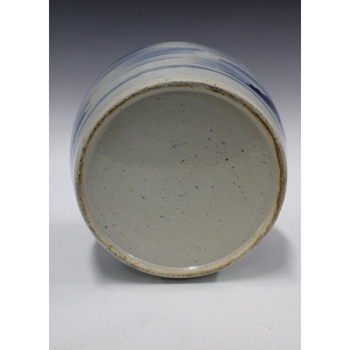 133 - Provincial chinese blue and white jar, typically painted with a landscape scene, 22 x 22cm.