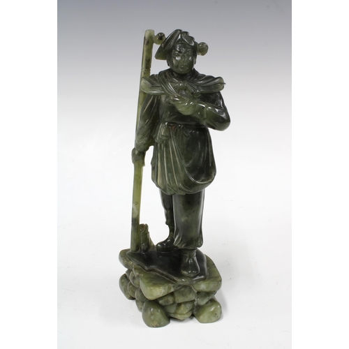 146 - Chinese soapstone carving of a soldier, 11 x 25cm.