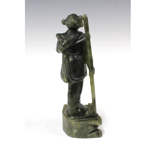 146 - Chinese soapstone carving of a soldier, 11 x 25cm.