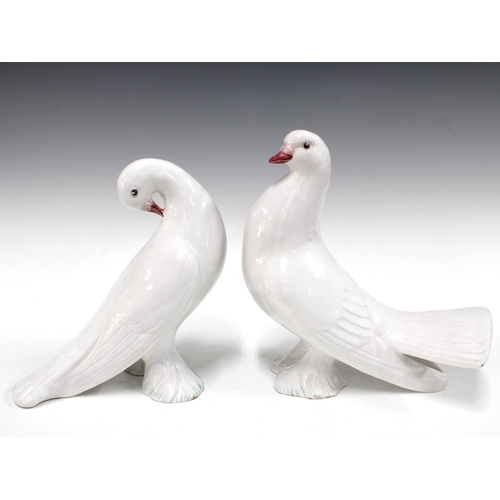 151 - Two Italian white glazed pottery doves (2) 25 x 26cm.