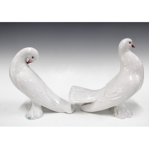 151 - Two Italian white glazed pottery doves (2) 25 x 26cm.