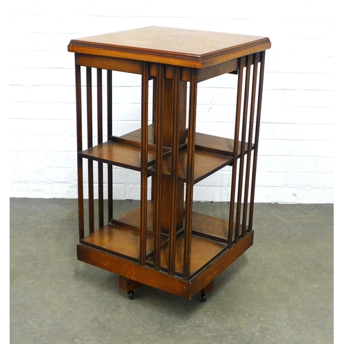 208 - An inlaid mahogany revolving bookcase, 46 x 86cm.