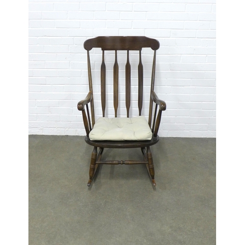 226 - Rocking chair, solid seat and turned legs, 63 x 104 x 50cm.