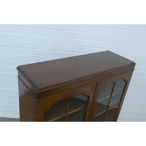 232 - Mahogany display cabinet, pair of glazed doors and plinth base,  88 x 112 x 30cm.