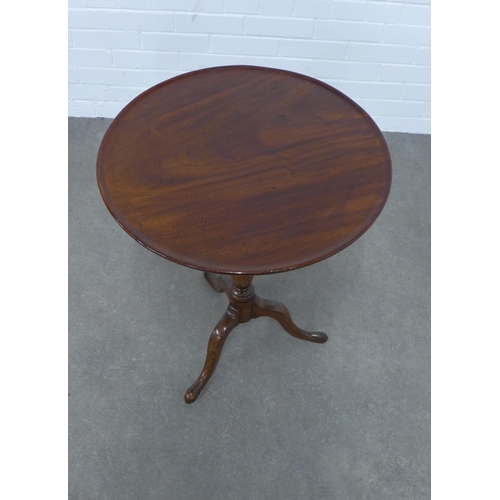 237 - Mahogany tilt top table, circular dished top on pedestal base with splayed tripod legs, 58 x 71cm.