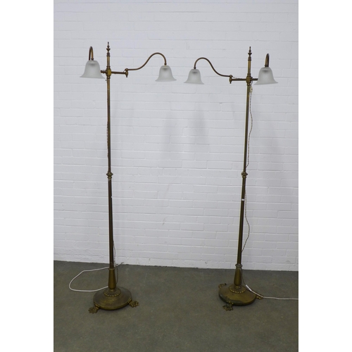 266 - A pair of brass twin branch standard lamps with opaque glass shades (2) 201cm high.