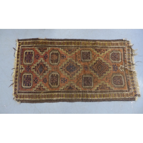 284 - Caucasian rug with brown field, 190 x 105cm.