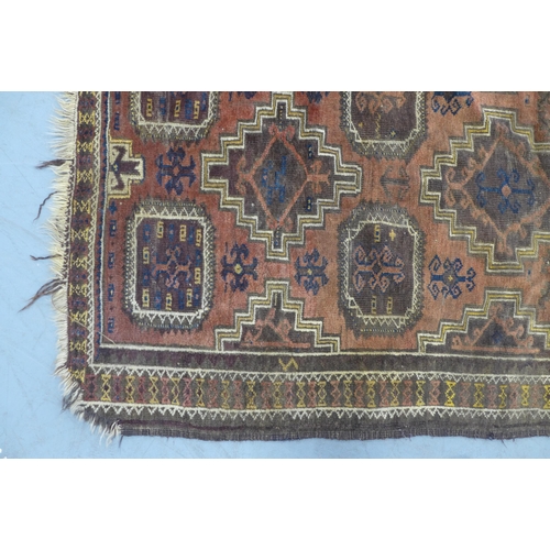 284 - Caucasian rug with brown field, 190 x 105cm.