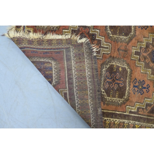 284 - Caucasian rug with brown field, 190 x 105cm.