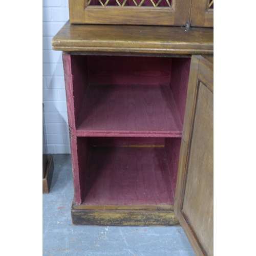 286 - Large 19th century stained pine bookcase cabinet,  the three cupboard doors with brass grills enclos... 