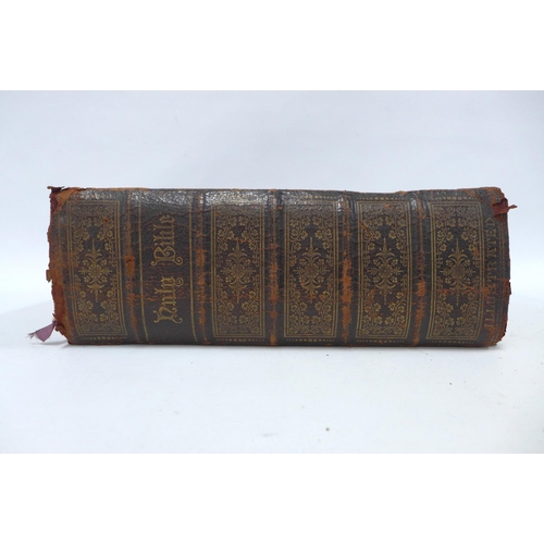 302 - Leather bound and brass mounted Holy Bible, Illustrated