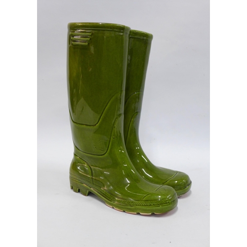 305 - Green glazed pottery Wellington boots planter / vase, 19 x 35cm.