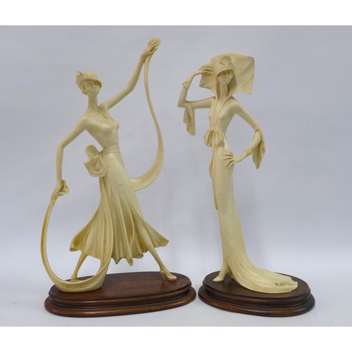 310 - A pair of Italian female figures, signed A. Santini, on wooden bases (2) 48cm.