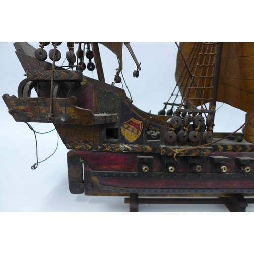 350 - The Golden Hind model ship on stand, 76cm.