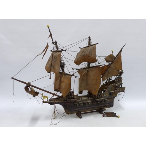 350 - The Golden Hind model ship on stand, 76cm.