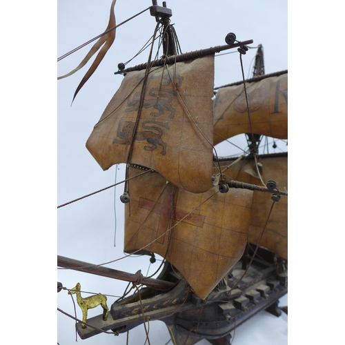 350 - The Golden Hind model ship on stand, 76cm.