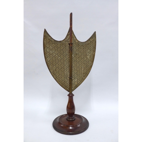 354 - Regency mahogany shield shaped stand with silk needlework panel (top a/f) 25 x 52cm.