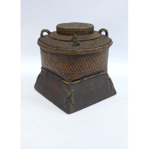 356 - Chinese basket with cover and four small looped handles, 23 x 22cm.