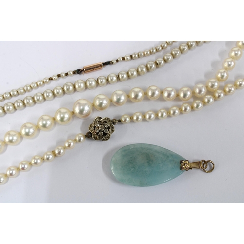 38 - Graduated pearl necklace with a 9ct gold flowerhead clasp, another single strand of pearls with a 9c... 