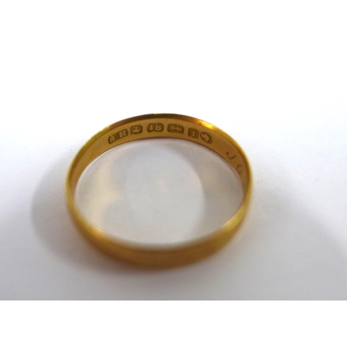 49 - A Victorian 18ct gold wedding band with hallmarks for Birmingham 1883 together with a platinum weddi... 