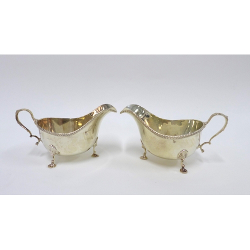 55 - A pair of George VI silver sauce boats by Walker & Hall, Sheffield 1945 (2)