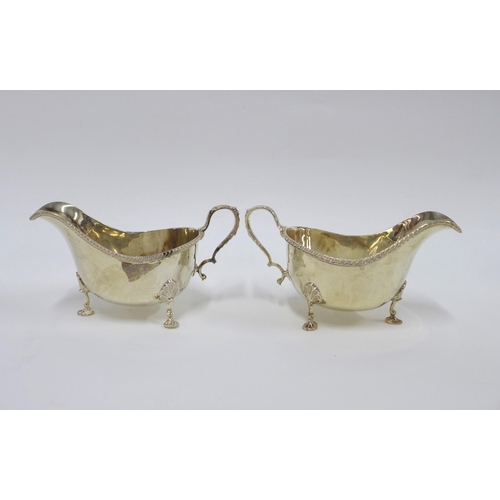 55 - A pair of George VI silver sauce boats by Walker & Hall, Sheffield 1945 (2)