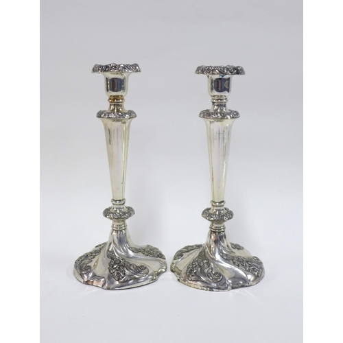 61 - A pair of silver plated knop stem candlesticks, (weighted base) (2) 26cm