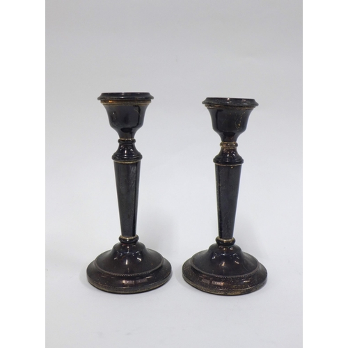 68 - A pair of Birmingham silver vases, weighted base, 13cm (2)