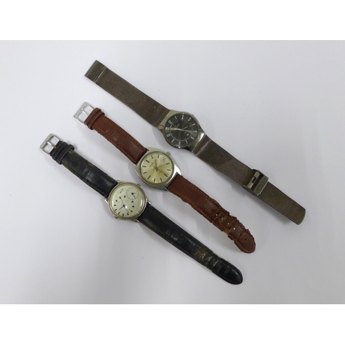 72 - Gents group of three wristwatches to include Skagen, Dual Time & Garrard (3)