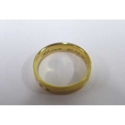 73 - 18ct gold bracelet, stamped 750 and two yellow metal rings, one with indistinct marks (3)