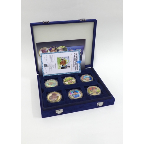 74 - Cased set of Gold Plated QEII commemorative coins - the Arthur Edwards Royal Photographer set, 2 tra... 