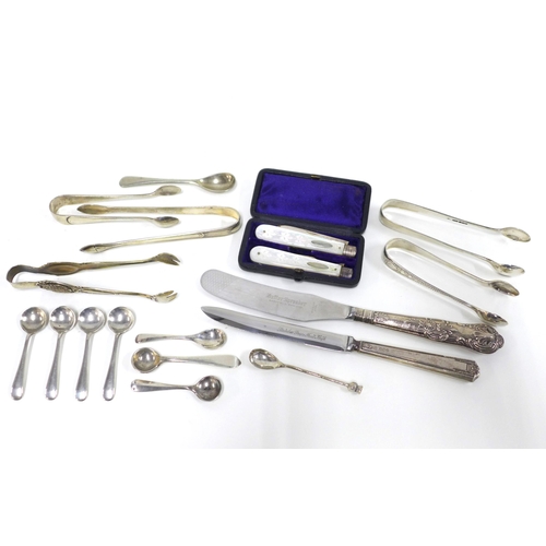 78 - 5 silver sugar tongs and various silver salt spoons, two silver handled knives and a pair of silver ... 