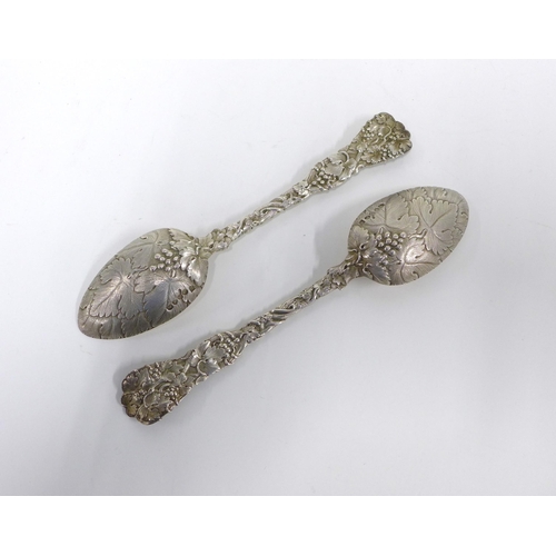 86 - A pair of William IV silver fruit and vine  tablespoons, William Theobalds & Lockington Bunn, London... 