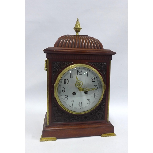 394 - Mahogany and brass mounted bracket clock with silvered dial and Arabic numerals, case is 35cm high e... 