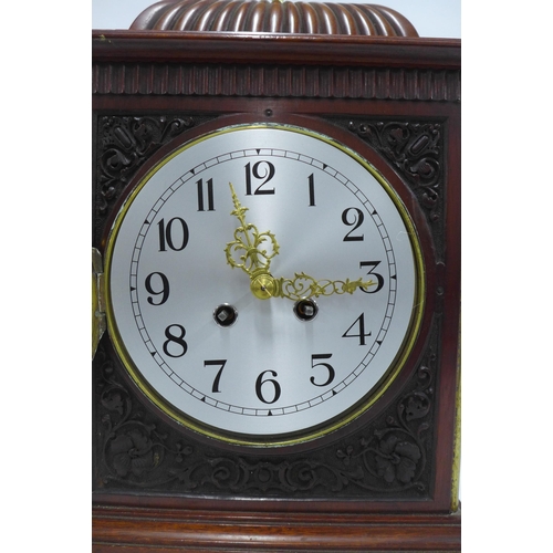 394 - Mahogany and brass mounted bracket clock with silvered dial and Arabic numerals, case is 35cm high e... 