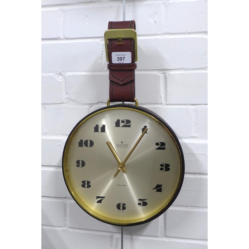 397 - Junghans Ato-Mat wall clock, circular silvered dial with Arabic numerals, with brown leather belt su... 