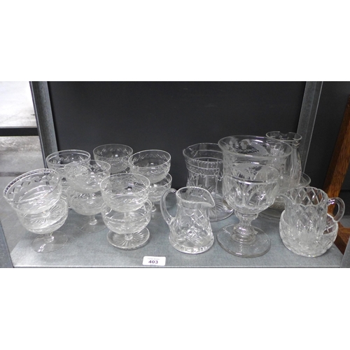 403 - Glassware to include sundae glass dishes, celery vase, water jugs etc (a lot)