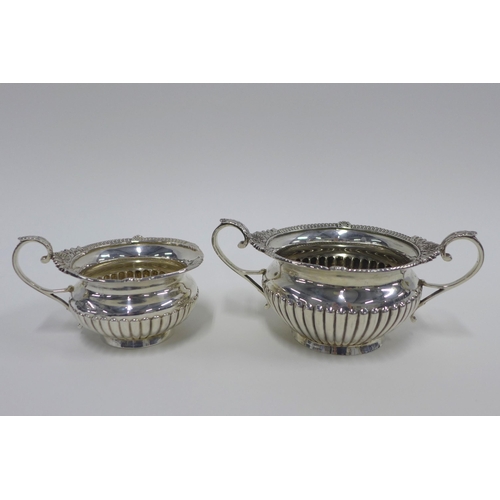 83 - Victorian silver sugar bowl and cream jug, Walker & Hall,  Sheffield 1899 (2)