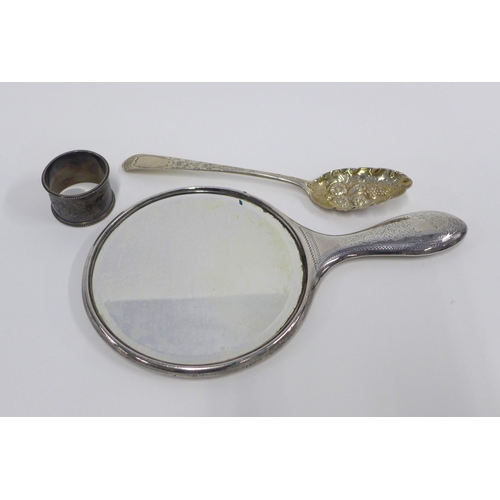 84 - Georgian Scottish silver berry spoon, Edinburgh 1802, a silver backed hand mirror and an Edwardian L... 