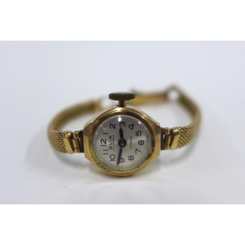 100B - Lady's 9ct gold wristwatch on a 9ct gold bracelet strap together with an Elco 9ct gold wristwatch on... 