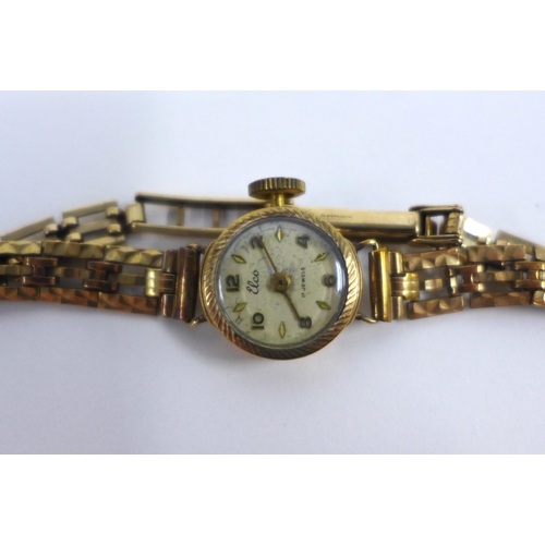 100B - Lady's 9ct gold wristwatch on a 9ct gold bracelet strap together with an Elco 9ct gold wristwatch on... 