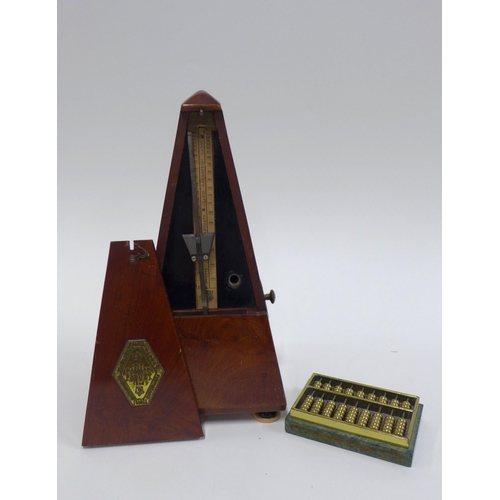 378 - Paquet French metronome and an abacus desk paperweight (2)