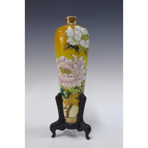 102 - Japanese Meiji  slender baluster vase painted with stylised flowers, on wooden stand, base signed, 2... 