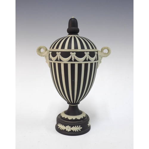 109 - Wedgwood black and white striped jasper ware urn with cover, 20th century, with satyr handles and ac... 