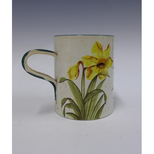 124 - Large Wemyss Ware, Robert Heron & Son, daffodil  patterned mug, handle restored, 14.5cm